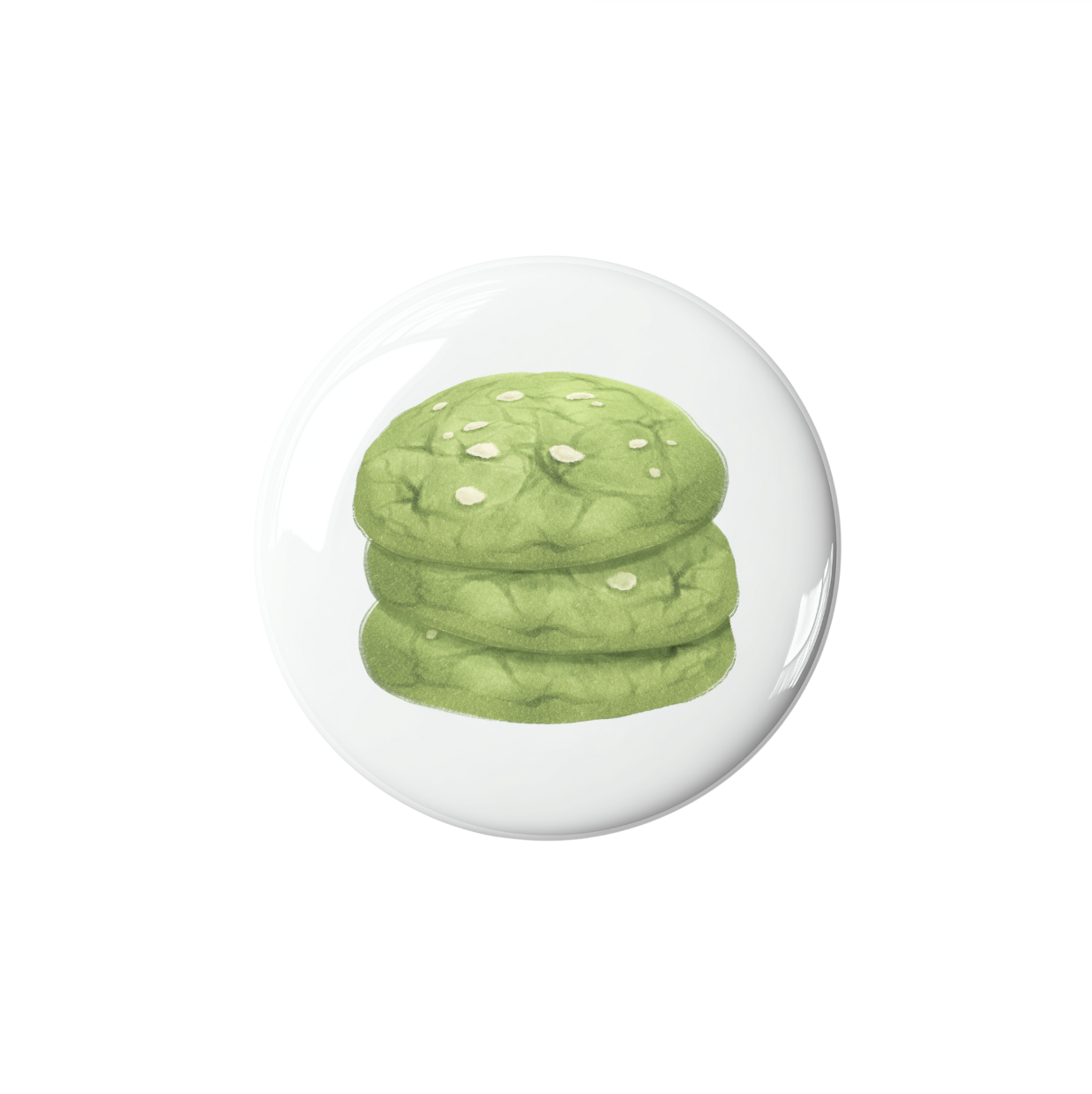 Green matcha cookies in a glass dome on a white background